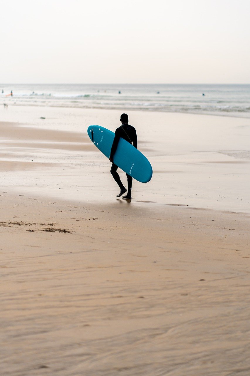 man, beach, surf-7816702.jpg